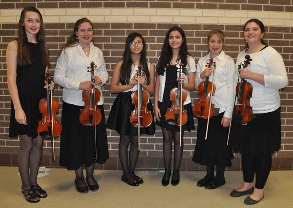 Violin students in the Music Preparatory Division at Stephen F. Austin State University who performed recently in the Middle School All-Region Orchestra concert at Longview High School 