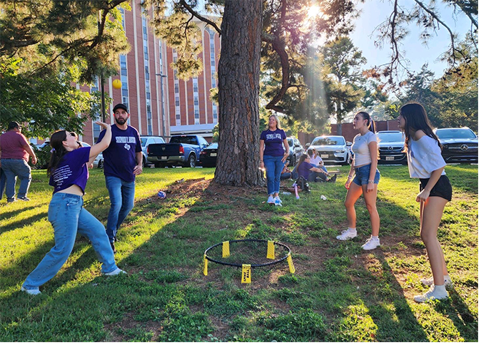 Students playing Spikeball