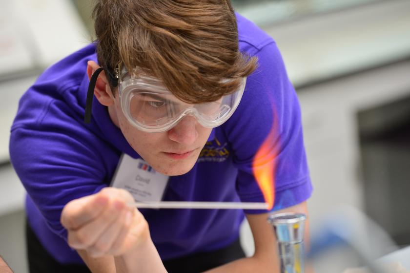 student performing an experiment