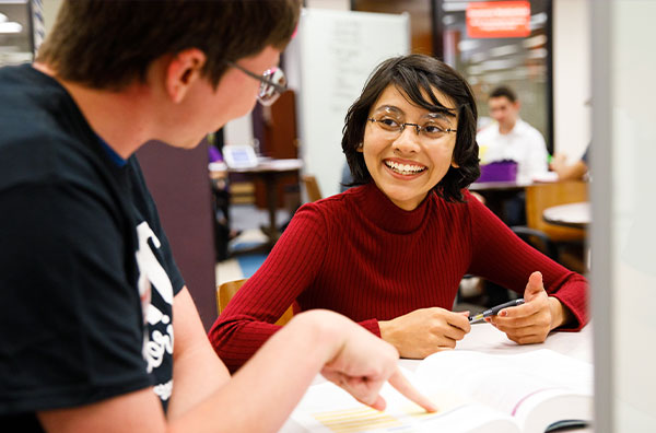 Student smiling at tutor