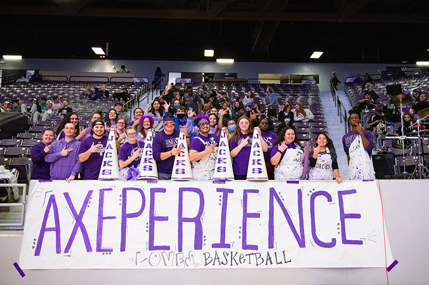 AXEperience student organization members at a basketball game