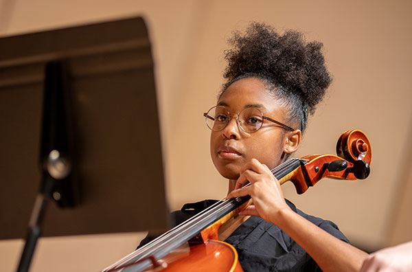 Student playing cello