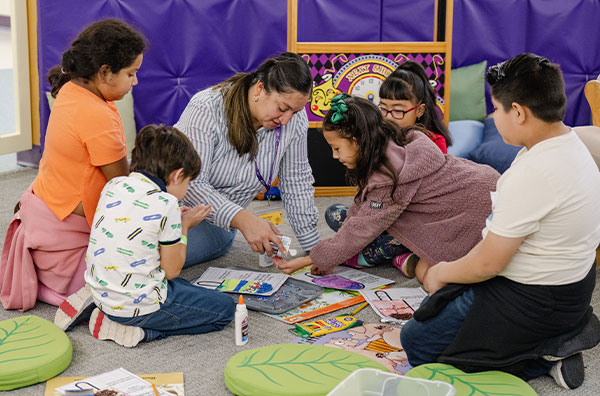 Instructor working with students