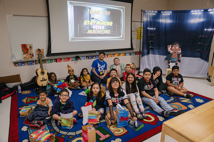 Group shot with students at a Project Raices event