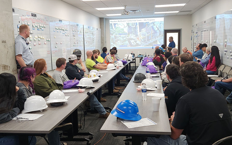 Students attending a safety briefing for touring a construction site