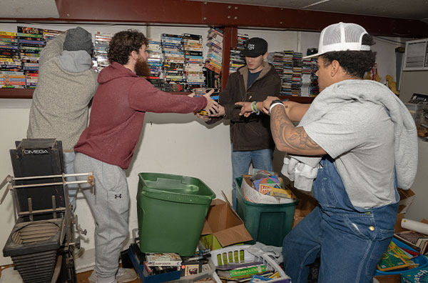 Students helping clean