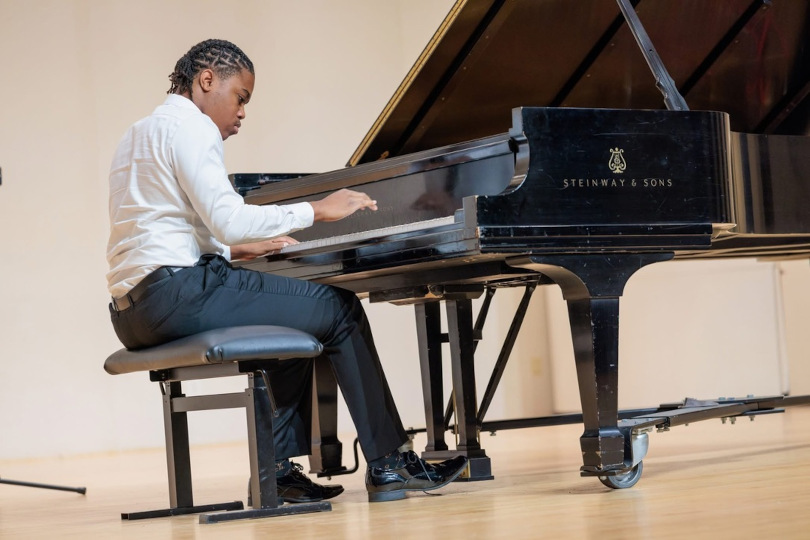 A student performs at the piano