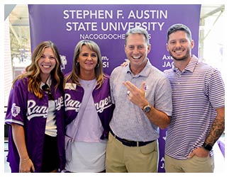 President Neal Weaver at the Texas Rangers’ SFA Night with wife, Kristi, and son and daughter-in-law, Blake and Alexis.