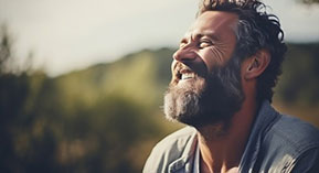 smiling man looking up