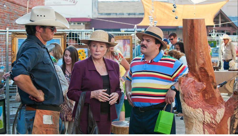 From left, Doug Moreland, Shirley MacLaine and Jack Black are shot as their characters — chainsaw artist, Marjorie Nugent and Bernie Tiede, respectively — on the set of "Bernie."