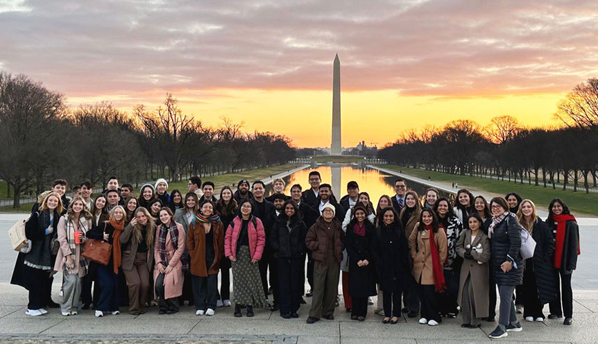 Spring 2024 Archer Fellows in Washington, D.C. at sunrise in front of the Washington monument