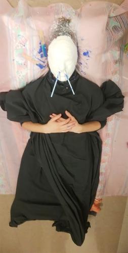 photo of a step in the process of creating a cast of a face