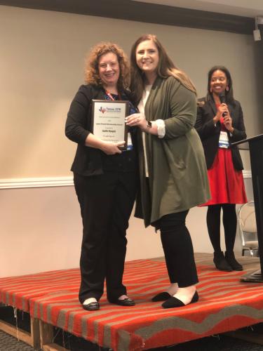 Dr. Jennifer Newquist receiving the Lane Powell Mentorship Award