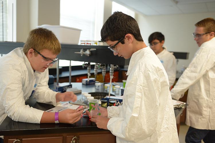 iMAS students working on a project