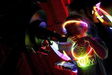 After nightfall, Molly Childs, a participant in SFA’s Lil’ STEM Jacks program, is able to see Jupiter and four of its moons through a high-powered telescope at the SFA Observatory.