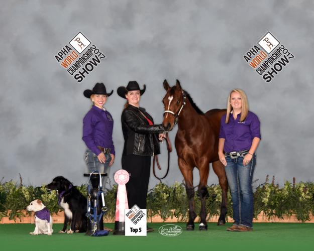SFA student Kelsey Chatigny, Michaelle Coker, SFA equine center supervisor, Remember the Name, and SFA student Sarah Bone