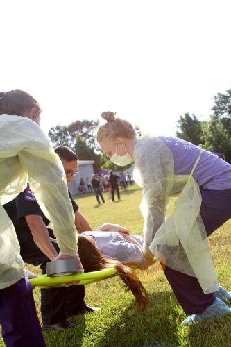 SFA nursing students participate in community-crisis simulation, acting as both patients and medics.