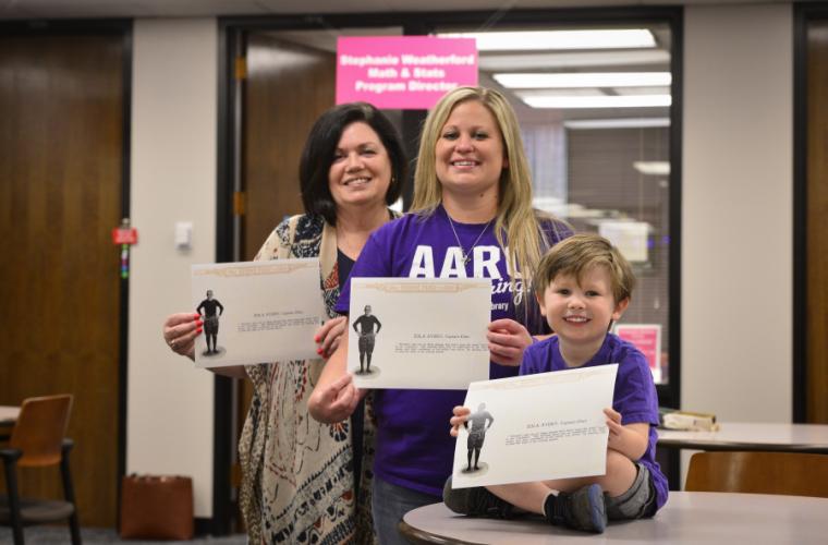 Avery’s granddaughter, Maggie Brown, great-granddaughter Stephanie Weatherford ’08 and ’11, and great-great grandson JT Weatherford
