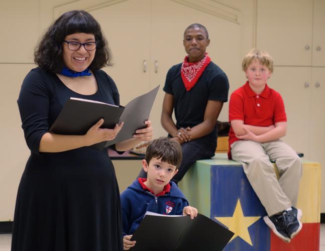 SFA theatre students and members of the Fredonia Players Angelica Banda and Eric Gibson involve Christ Episcopal School students Seth Jones and Nicholas Bacarisse in an interactive history lesson. 