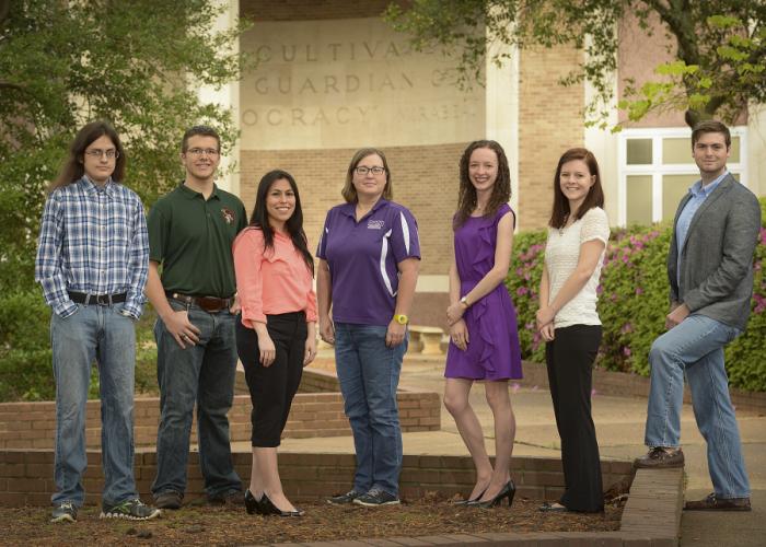 Dr. Alyx Frantzen, associate professor of chemistry, pictured with SFA students