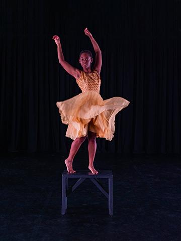 a member of the SFA Repertory Dance Company in costume