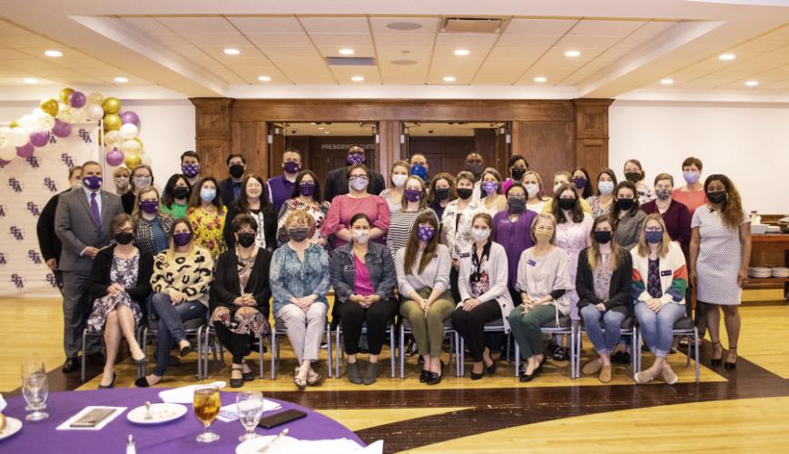 group photo of luncheon attendees
