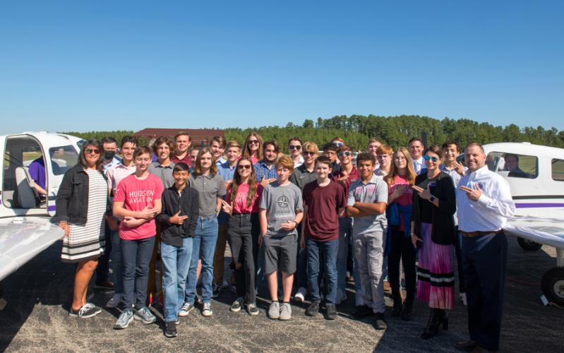 Students studying aviation at Hudson High School visited with Stephen F. Austin State University aviation students during an event at A.L. Mangham Jr. Regional Airport.