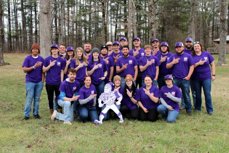 SFA's timbersports team, the Sylvans, pose for a photo