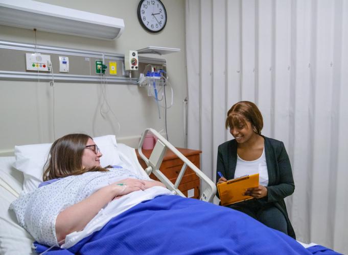Nursing students participate in a mock ICU lab simulation