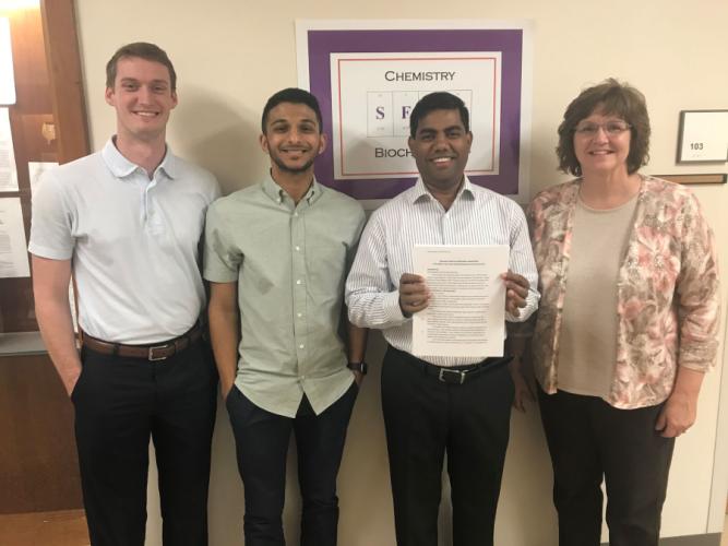 Dr. Matibur Zamadar with students Jacob Herschmann and Aqeeb Ali, and Assoicate Dean Dr. Michele Harris