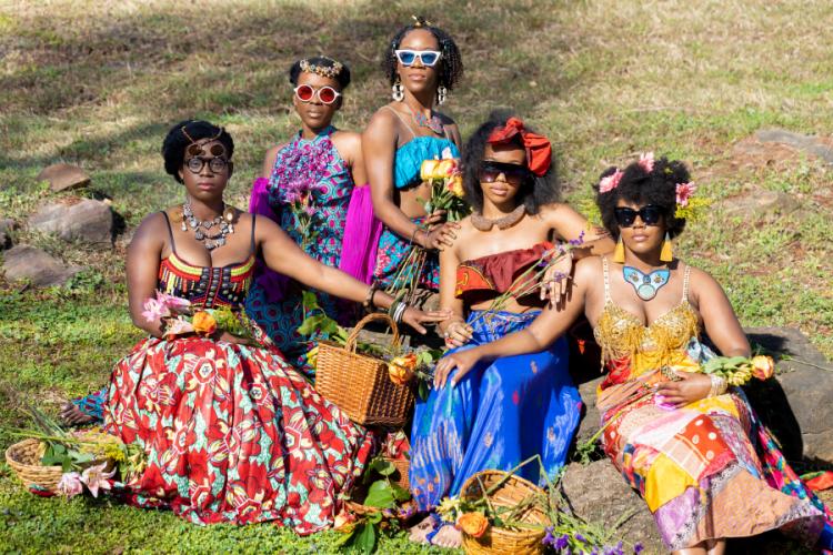 multidisciplinary artist Stacey Allen is pictured with four other women