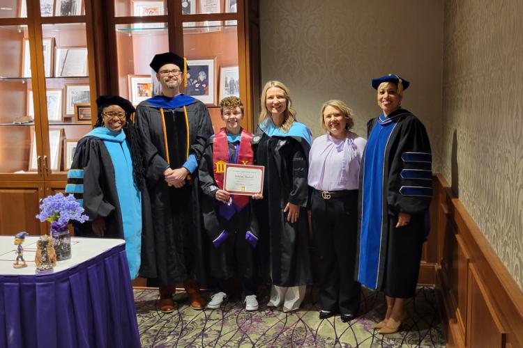 Ashton Maisel appears with Dr. Veronica Beavers, Dr. Pietro A. Sasso, Dr. Hollie Smith, Lacey Folsom and Dr. Michara DeLaney-Fields