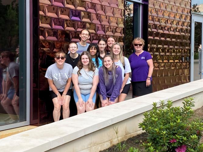 a group photo of theatre students and faculty heading to Scotland in August to tour the show "Grandfather Frog's Tales of the Meadow" at the Edinburgh Festival Fringe