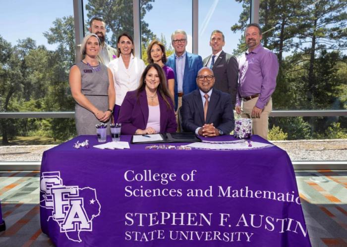 The University of Texas at Tyler School of Medicine officials and Stephen F. Austin State University representatives sign an early assurance program agreement to create a pathway for students between their undergraduate degree and medical school.