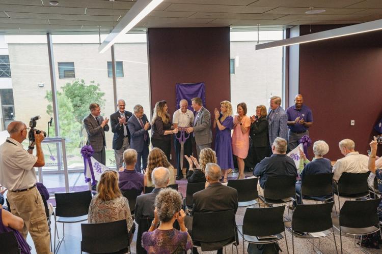 Stephen F. Austin State University Interim President Gina Oglesbee, SFA benefactor Bill Elliott and Micky Elliott College of Fine Arts Dean Dr. Gary Wurtz are surrounded by former SFA Board of Regents members