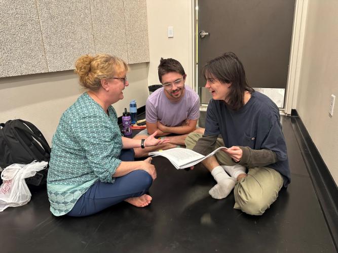 SFA theatre Professor Angela Bacarisse works with students Keelan Bourne, a senior Rose Bruford American Theatre Arts student from Nuneaton, United Kingdom, and senior theatre major Connor Molen from Denton, on perfecting their roles in the SFA School of Theatre and Dance and School of Music’s presentation of “Once Upon a Mattress.”
