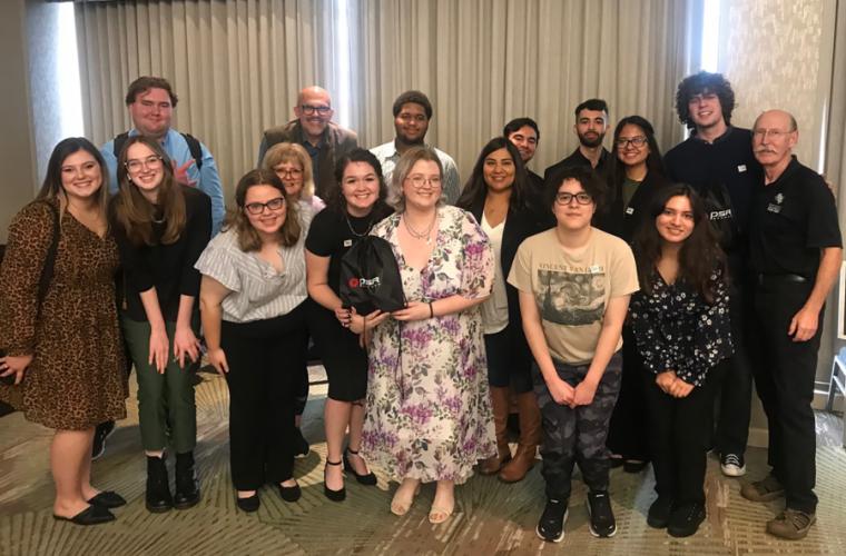 SFA student and faculty representatives pose for a group photo