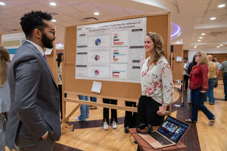 Finalists present their research during the poster session at Stephen F. Austin State University’s 2023 Undergraduate Research Conference.