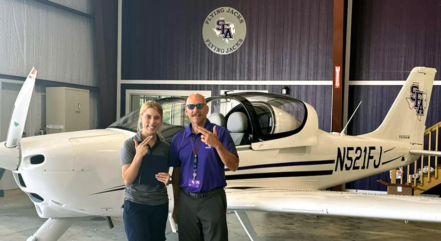 SFA's chief instructor pilot Jack Gainer with Josi Oujesky, a first-year aviation sciences major from Pearland