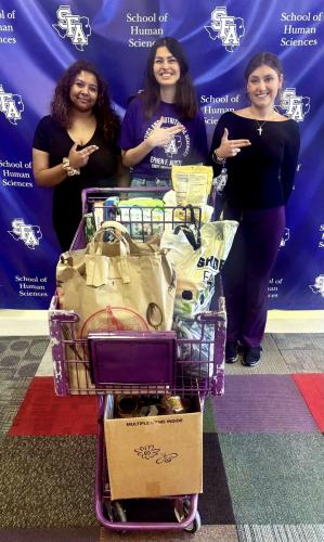 Esha Ganguly, a senior from Houston and SAND treasurer; Ashley Liston, a senior from Austin and SAND president; and Margo Thompson, a senior from Mobile, Alabama, and SAND vice president