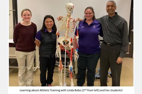 learning about Athletic Training with Linda Bobo (2nd from left) and her students