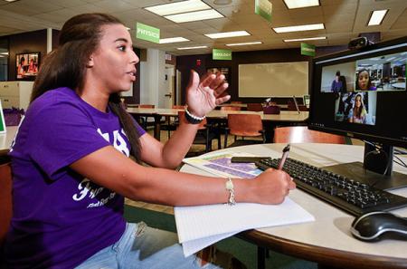 Senior Maci McCurley of Lumberton, an elementary education/special education major, has worked at the AARC since 2017. During the COVID-19 crisis, she assisted AARC staff members with the transition to online tutoring so students could continue to receive academic assistance from a distance. Photo by Hardy Meredith ’81