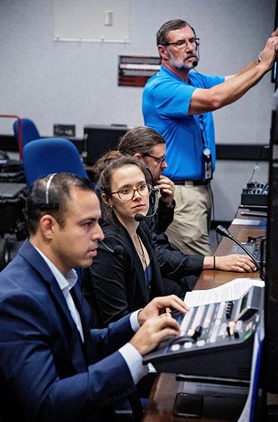 From outside the historic Apollo Mission Control Room, Volkman produces a portion of NASA's Apollo 11 50th anniversary broadcast “NASA's Giant Leaps: Past and Future” in July 2019. Photo courtesy of NASA