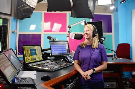 Cami Henz on air with Irving-based radio program “The Kidd Kraddick Morning Show.”
