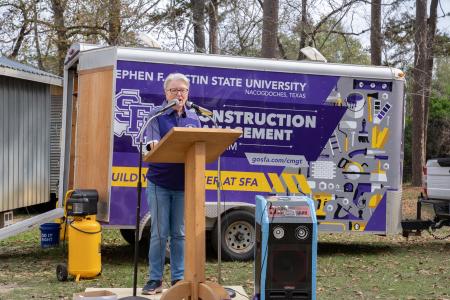 Sally Ann Swearingen, associate professor of interior design and construction management, speaking at the event.