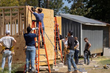Construction Management students constructing tiny home.