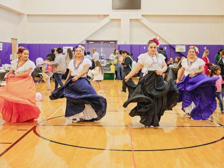 Each Project Raíces Language and Literacy Academia features a kermés, or carnival, where students, parents and teachers play bilingual language games. Additionally, musicians and artists present cultural performances and host classes for parents and children. 