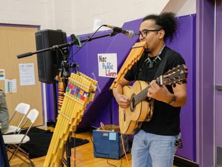 Musician Enrique Munguia performed for attendees during one of Project Raíces' kermés.