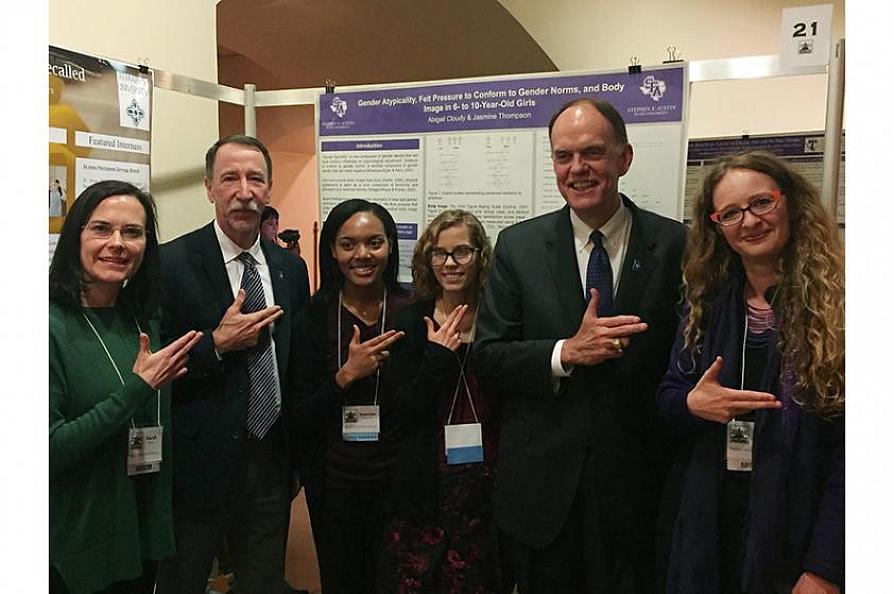 Pictured from left, Dr. Sarah Savoy, associate professor of psychology and research mentor; Dr. Steve Bullard, SFA provost and vice president for academic affairs; Thompson; Cloudy; Dr. Steve Westbrook, interim SFA president; and Dr. Flora Farago, assistant professor of human development and family studies, and research mentor.