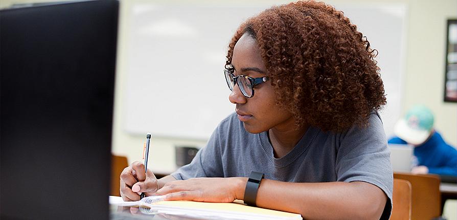 student making checklist